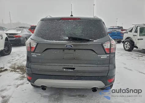 2017 Ford Escape Titanium z USA, uszkodzony, nr VIN 1FMCU0J97HUA21586